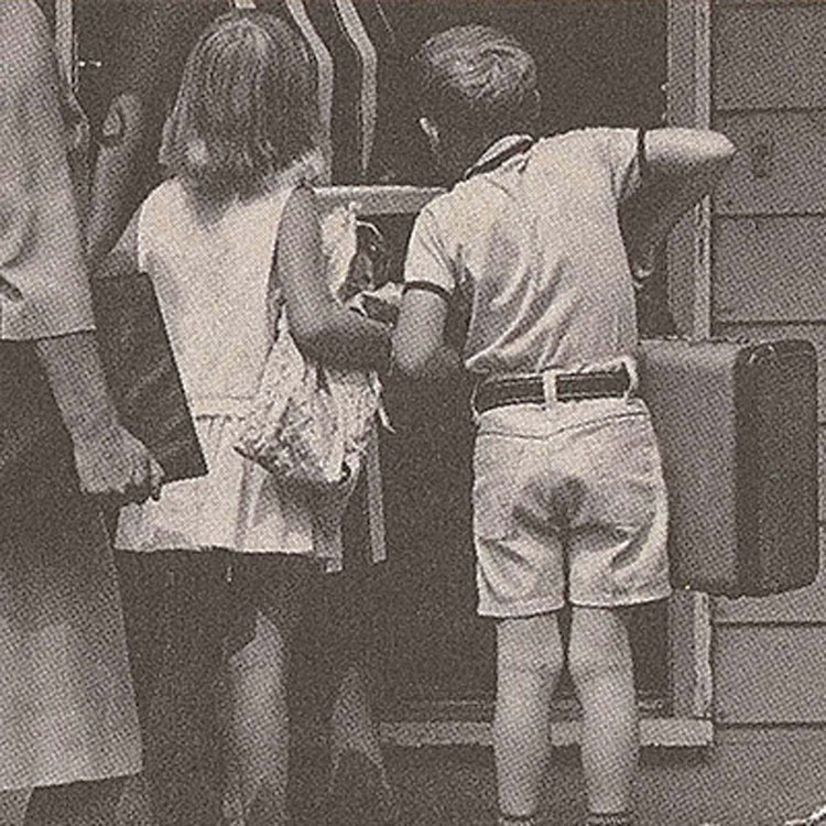 Children looking into original home